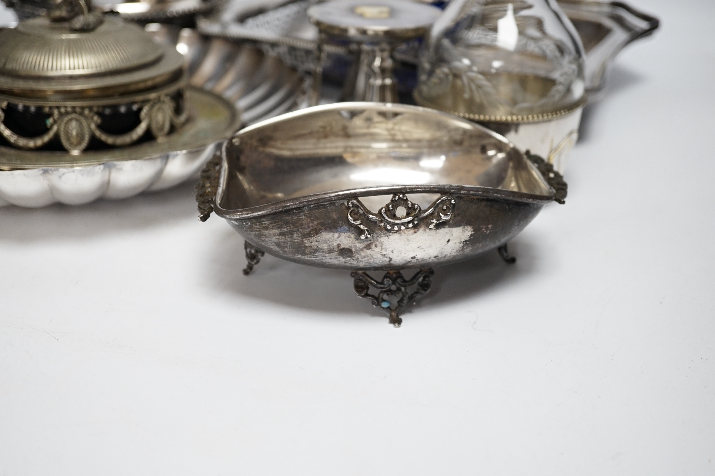 A plated egg cruet and sundry plate